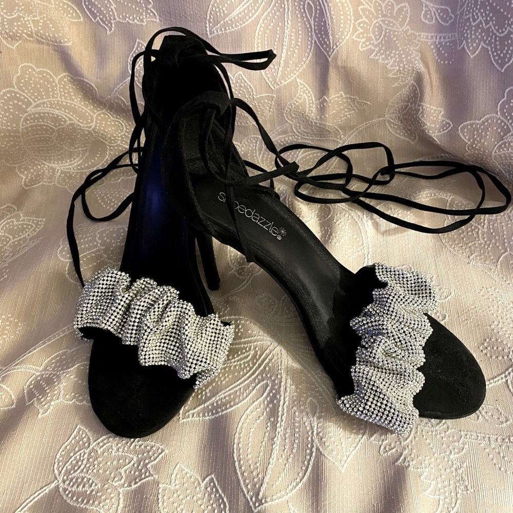 Black lace up hills with beautiful rhinestones at the front of shoe